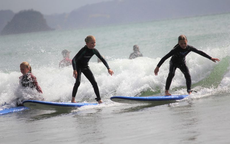 Teens surfing