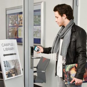 Man using digital key to access school library